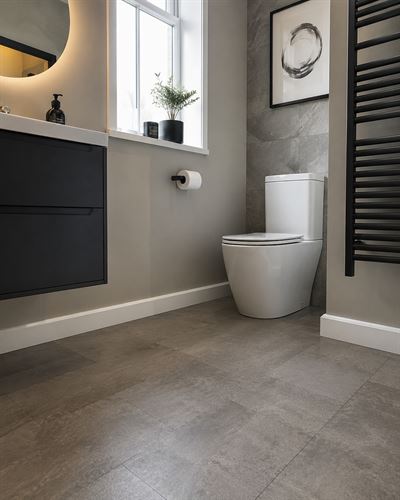 Bathroom with ThermaSkirt running along the base of the walls