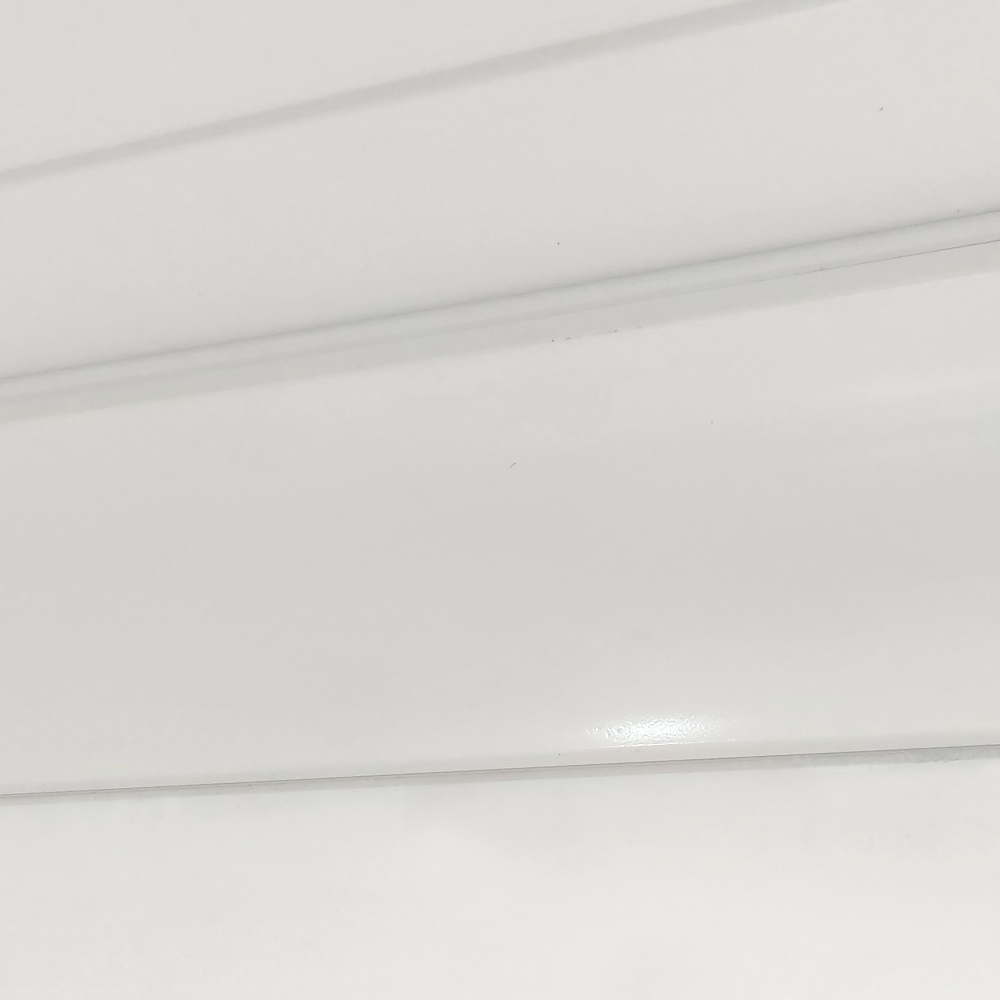 ThermaCurve colour-matched coving detail along the ceiling line
